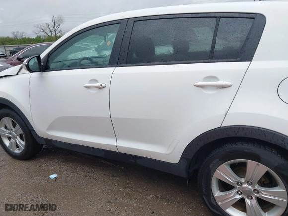 2012 Kia Sportage LX with VIN KNDPB3A2XC7283612, listed as a IAAI auction lot 41957810 with 165,899 mi miles. Bid and sale history available at carsss.com. Image 14.