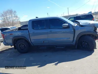 2023 Nissan Frontier SV with VIN 1N6ED1EK2PN633278, listed as a IAAI auction lot 41854671 with 59,549 mi miles and . Bid and sale history available at DreamBid. Image 14.