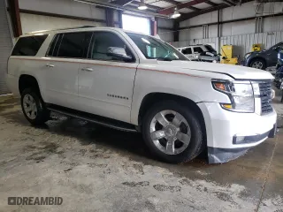2020 Chevrolet Suburban Premier with VIN 1GNSKJKC5LR174248, listed as a Copart auction lot 73365664 with 124,755 mi miles and Salvage Title. Bid and sale history available at carsss.com. Image 4.