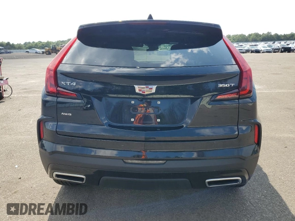 2024 Cadillac XT4 AWD Premium Luxury with VIN 1GYFZDR49RF112460, listed as a Copart auction lot 67183524 with 12,396 mi miles and Salvage title. Bid and sale history available at DreamBid. Image 6.