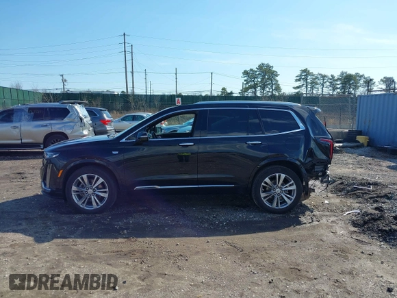 2023 Cadillac XT6 AWD Premium Luxury with VIN 1GYKPDRS8PZ153838, listed as a IAAI auction lot 41838527 with 60,034 mi miles and . Bid and sale history available at DreamBid. Image 14.