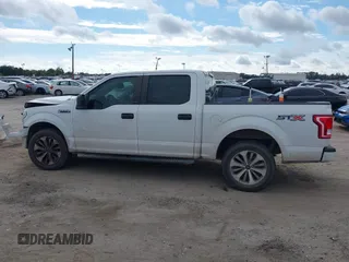 2017 Ford F-150 XL with VIN 1FTEW1CF6HFA51201, listed as a IAAI auction lot 38205513 with 313,459 mi miles. Bid and sale history available at carsss.com. Image 15.