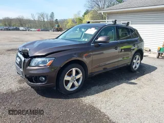 2012 Audi Q5 2.0T Premium Plus with VIN WA1LFAFP5CA024857, listed as a IAAI auction lot 42016833 with 141,144 mi miles. Bid and sale history available at carsss.com. Image 2.