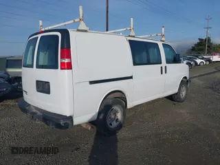 2014 Chevrolet Express Cargo Van with VIN 1GCWGFBA3E1122402, listed as a IAAI auction lot 41795180 with 1 mi miles. Bid and sale history available at carsss.com. Image 4.