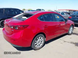 2016 Mazda Mazda3 i Sport with VIN JM1BM1U71G1345696, listed as a IAAI auction lot 41845701 with 141,646 mi miles. Bid and sale history available at carsss.com. Image 4.