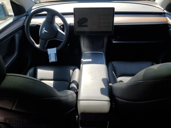 2024 Tesla Model Y Long Range with VIN 7SAYGDEE9RF120729, listed as a Copart auction lot 57360265 with 21,589 mi miles and Salvage title. Bid and sale history available at DreamBid. Image 8.