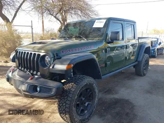 2021 Jeep Gladiator Mojave with VIN 1C6JJTEG8ML606876, listed as a IAAI auction lot 41632052 with 30,255 mi miles and . Bid and sale history available at DreamBid. Image 17.