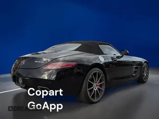 2012 Mercedes-Benz SLS AMG z VIN WDDRK7HA9CA006858, wystawiony jako Copart lot #46749725 z przebiegiem 20 085 mil mil oraz Tytuł czysty. Historia ofert i sprzedaży dostępna na DreamBid. Obrazek 4.