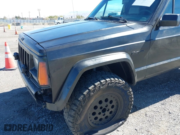 1994 Jeep Cherokee Sport with VIN 1J4FJ68S2RL175128, listed as a IAAI auction lot 41722936 with 345,700 mi miles and . Bid and sale history available at DreamBid. Image 6.