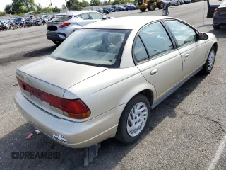 1999 Saturn SL with VIN 1G8ZK5275XZ262816, listed as a Copart auction lot 54144092 with 60,424 mi miles and Salvage title. Bid and sale history available at DreamBid. Image 4.