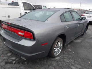 2012 Dodge Charger SXT with VIN 2C3CDXHG1CH278891, listed as a IAAI auction lot 38667338 with 114,099 mi miles. Bid and sale history available at carsss.com. Image 4.