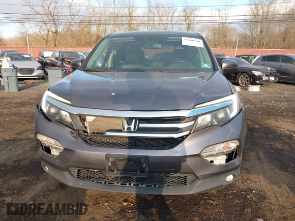 2016 Honda Pilot EX-L with VIN 5FNYF6H75GB053780, listed as a IAAI auction lot 41340590 with 203,190 mi miles. Bid and sale history available at carsss.com. Image 12.