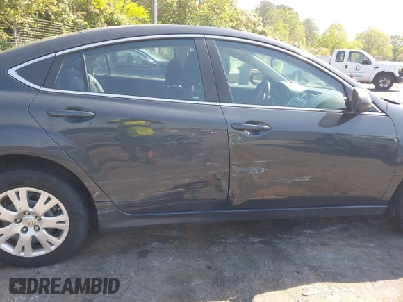 2012 Mazda 6 i Sport with VIN 1YVHZ8BH4C5M01305, listed as a IAAI auction lot 42032393 with 244,764 mi miles and . Bid and sale history available at DreamBid. Image 6.