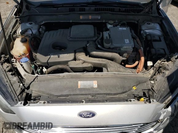2017 Ford Fusion Hybrid SE z VIN 3FA6P0LU9HR306927, wystawiony jako Copart lot #63943395 z przebiegiem 157 851 mil mil oraz Czysty tytuł • Clean title. Historia ofert i sprzedaży dostępna na DreamBid. Obrazek 11.