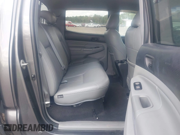 2014 Toyota Tacoma with VIN 5TFLU4EN9EX099414, listed as a IAAI auction lot 40528514 with 122,827 mi miles. Bid and sale history available at carsss.com. Image 8.