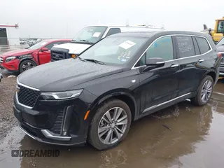 2025 Cadillac XT6 FWD Premium Luxury with VIN 1GYKPCRS3SZ120054, listed as a IAAI auction lot 42166157 with 16,280 mi miles and . Bid and sale history available at DreamBid. Image 19.