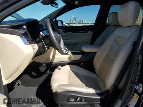 2018 Cadillac XT5 Premium Luxury FWD z VIN 1GYKNERS3JZ133029, wystawiony jako Copart lot #55932695 z przebiegiem 93 098 mil mil oraz Szkoda całkowita • Salvage title. Historia ofert i sprzedaży dostępna na DreamBid. Obrazek 7.