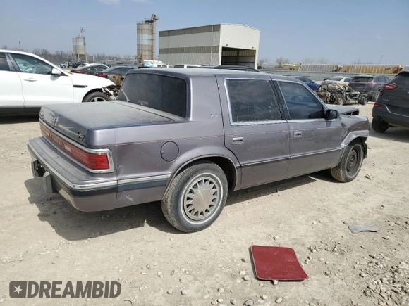 1993 Dodge Dynasty z VIN 1B3XC4638PD195963, wystawiony jako Copart lot #49120625 z przebiegiem 86 825 mil mil oraz Szkoda całkowita • Salvage title. Historia ofert i sprzedaży dostępna na DreamBid. Obrazek 3.