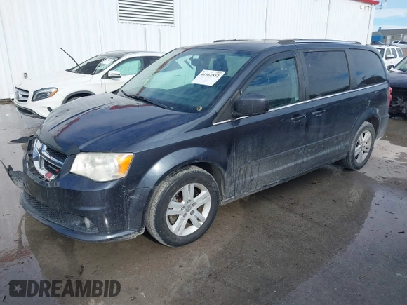 2013 Dodge Grand Caravan Crew with VIN 2C4RDGDG9DR740086, listed as a IAAI auction lot 41362852 with 145,881 mi miles and . Bid and sale history available at DreamBid. Image 16.