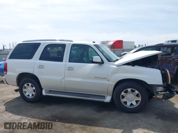 2005 Cadillac Escalade z VIN 1GYEC63N25R200026, wystawiony jako IAAI lot #41761210 z przebiegiem 226 747 mil mil oraz . Historia ofert i sprzedaży dostępna na DreamBid. Obrazek 14.