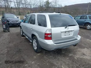 2006 Acura MDX Touring RES w/Navi with VIN 2HNYD18926H511319, listed as a IAAI auction lot 41802256 with 216,637 mi miles. Bid and sale history available at carsss.com. Image 3.