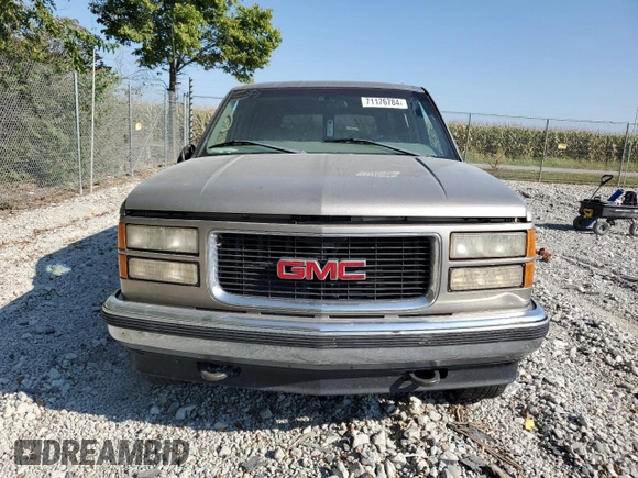 1999 GMC Yukon with VIN 1GKEK13R5XJ725991, listed as a Copart auction lot 71176784 with 245,481 mi miles and Clean Title. Bid and sale history available at carsss.com. Image 5.