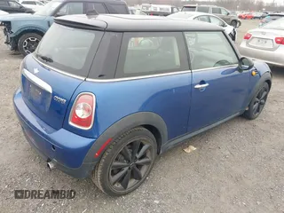 2013 MINI Hardtop with VIN WMWSU3C54DT375008, listed as a IAAI auction lot 41751594 with 136,269 mi miles and . Bid and sale history available at DreamBid. Image 4.