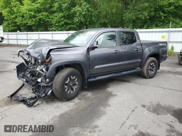 2021 Toyota Tacoma SR z VIN 3TYCZ5ANXMT050566, wystawiony jako Copart lot #57315615 z przebiegiem Nie podano mil oraz Szkoda całkowita • Salvage title. Historia ofert i sprzedaży dostępna na DreamBid. Obrazek 1.