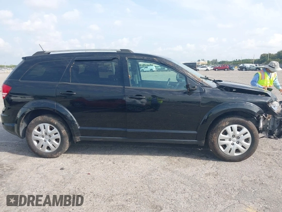 2017 Dodge Journey SE with VIN 3C4PDCAB4HT691343, listed as a IAAI auction lot 41863725 with 99,519 mi miles and . Bid and sale history available at carsss.com. Image 13.