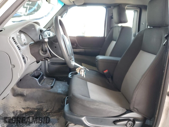 2011 Ford Ranger XLT with VIN 1FTLR4FE4BPA81673, listed as a Copart auction lot 61954995 with 151,836 mi miles and Salvage title. Bid and sale history available at DreamBid. Image 7.