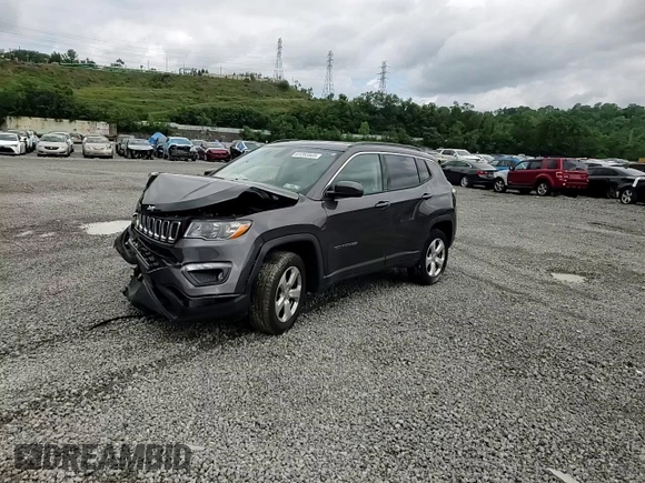 2019 Jeep Compass Latitude z VIN 3C4NJDBB4KT670391, wystawiony jako Copart lot #61283805 z przebiegiem 80 584 mil mil oraz Szkoda całkowita • Salvage title. Historia ofert i sprzedaży dostępna na DreamBid. Obrazek 14.