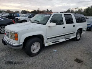 1995 GMC Suburban z VIN 1GKFK16K3SJ704911, wystawiony jako Copart lot #88326825 z przebiegiem 191 006 mil mil oraz Szkoda całkowita • Salvage title. Historia ofert i sprzedaży dostępna na DreamBid. Obrazek 1.