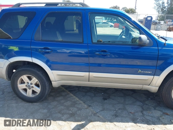 2007 Ford Escape Hybrid with VIN 1FMYU59H07KB79129, listed as a IAAI auction lot 41765085 with 97,723 mi miles and . Bid and sale history available at DreamBid. Image 13.