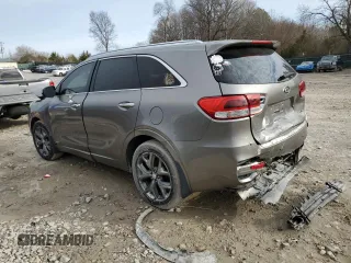2016 Kia Sorento SX with VIN 5XYPKDA59GG008256, listed as a Copart auction lot 48056665 with 216,055 mi miles and Salvage Title. Bid and sale history available at carsss.com. Image 2.