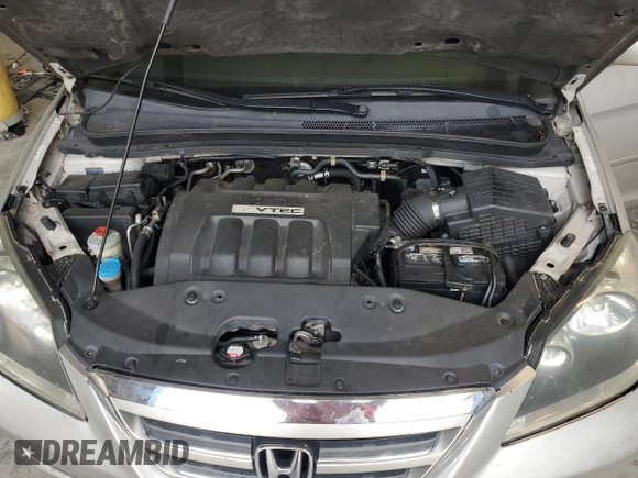 2007 Honda Odyssey EX with VIN 5FNRL38477B429624, listed as a Copart auction lot 53961825 with 144,957 mi miles and Salvage Title. Bid and sale history available at DreamBid. Image 12.
