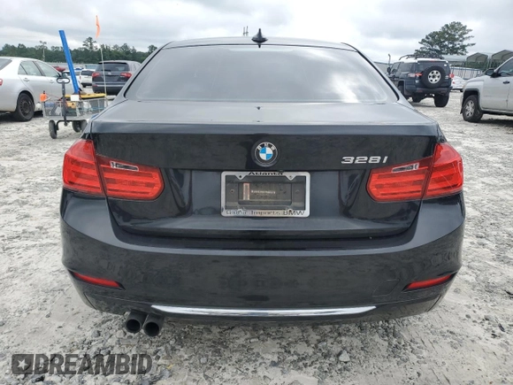 2014 BMW 3 Series 328i with VIN WBA3A5G54ENP31997, listed as a Copart auction lot 60720765 with 107,183 mi miles and Salvage title. Bid and sale history available at DreamBid. Image 6.