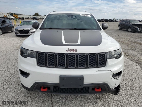 2019 Jeep Grand Cherokee Trailhawk with VIN 1C4RJFLT5KC645905, listed as a Copart auction lot 77326424 with 76,693 mi miles and Salvage Title. Bid and sale history available at carsss.com. Image 5.