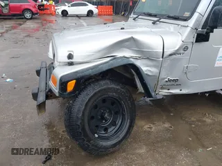 2006 Jeep Wrangler Sport Right Hand Drive with VIN 1J4F449SX6P764491, listed as a IAAI auction lot 41709726 with 290,798 mi miles. Bid and sale history available at carsss.com. Image 6.
