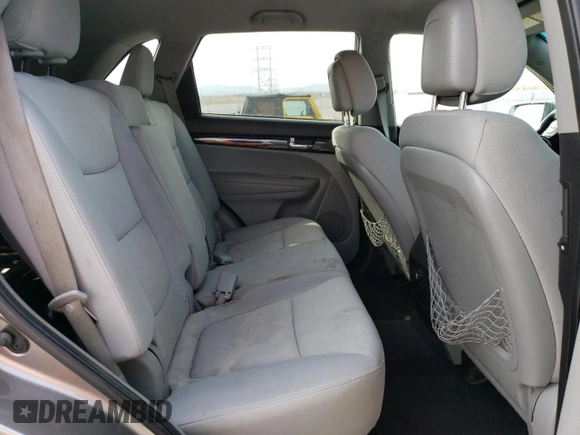 2013 Kia Sorento LX with VIN 5XYKTDA21DG401970, listed as a Copart auction lot 54079365 with 217,969 mi miles and Salvage title. Bid and sale history available at DreamBid. Image 11.