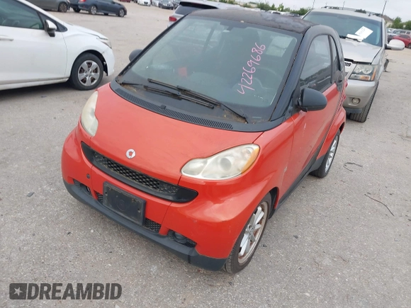 2008 Smart fortwo Pure z VIN WMEEJ31X28K206311, wystawiony jako IAAI lot #42269686 z przebiegiem 48 601 mil mil oraz . Historia ofert i sprzedaży dostępna na DreamBid. Obrazek 2.