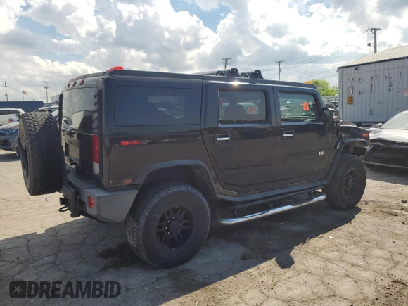 2006 Hummer H2 z VIN 5GRGN23U36H115579, wystawiony jako Copart lot #55753045 z przebiegiem 166 133 mil mil oraz Tytuł czysty. Historia ofert i sprzedaży dostępna na DreamBid. Obrazek 3.