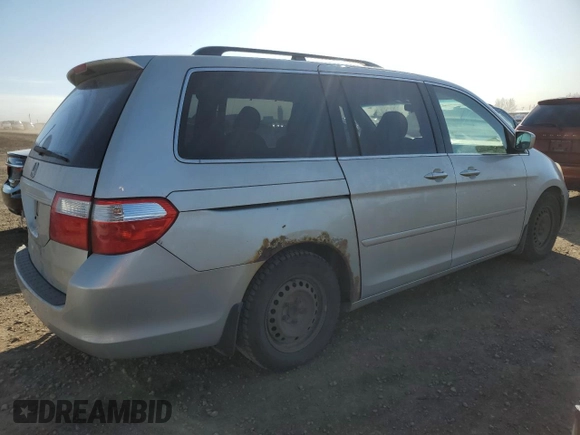 2005 Honda Odyssey EX with VIN 5FNRL38485B500908, listed as a Copart auction lot 55321385 with 448,908 mi miles and Salvage Title. Bid and sale history available at carsss.com. Image 3.