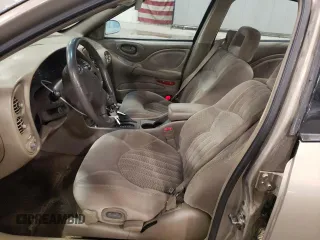 2002 Pontiac Bonneville SLE z VIN 1G2HY54K124211759, wystawiony jako Copart lot #54573555 z przebiegiem 106 409 mil mil oraz Szkoda całkowita • Salvage title. Historia ofert i sprzedaży dostępna na DreamBid. Obrazek 7.