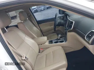 2017 Jeep Grand Cherokee Limited with VIN 1C4RJEBG4HC779411, listed as a IAAI auction lot 42383918 with 128,120 mi miles and . Bid and sale history available at DreamBid. Image 5.