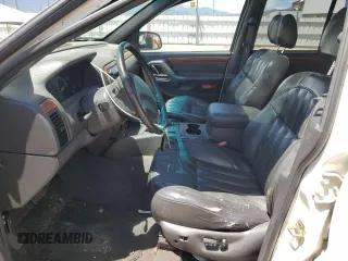 1999 Jeep Grand Cherokee Limited with VIN 1J4GW68N5XC549051, listed as a Copart auction lot 64376325 with 205,276 mi miles and Clean title. Bid and sale history available at DreamBid. Image 8.