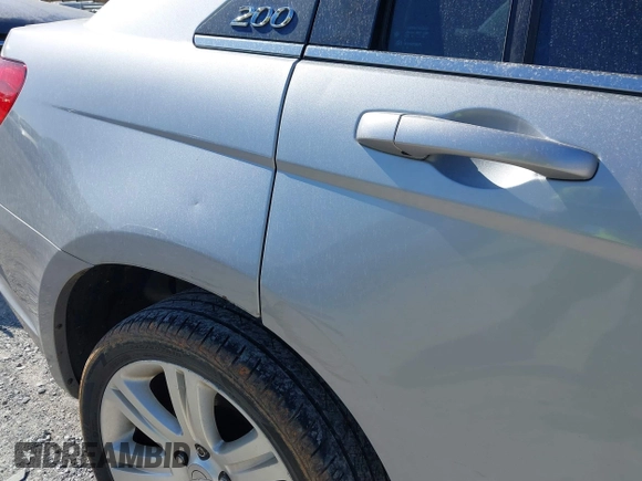 2013 Chrysler 200 Touring with VIN 1C3CCBBB4DN693621, listed as a IAAI auction lot 41738436 with 240,693 mi miles and . Bid and sale history available at DreamBid. Image 11.