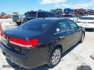 2011 Lincoln MKZ with VIN 3LNHL2GC9BR763431, listed as a IAAI auction lot 42037377 with 331,415 mi miles. Bid and sale history available at carsss.com. Image 4.