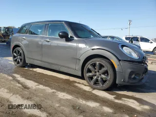 2018 MINI Clubman Cooper S with VIN WMWLN9C57J2E50986, listed as a Copart auction lot 77597404 with 107,606 mi miles and Salvage Title. Bid and sale history available at carsss.com. Image 4.