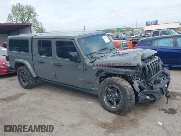 2021 Jeep Gladiator Rubicon with VIN 1C6JJTBG8ML619972, listed as a IAAI auction lot 42057805 with 37,875 mi miles and . Bid and sale history available at DreamBid. Image 14.