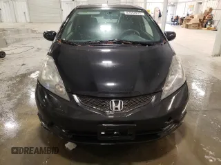 2009 Honda Fit with VIN JHMGE88259S053426, listed as a Copart auction lot 87894815 with 143,665 mi miles and Salvage Title. Bid and sale history available at carsss.com. Image 5.